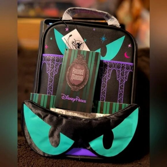 DISNEY PARKS Haunted Mansion Travel bag w/ sleep mask NWT​ - Picture 1 of 4